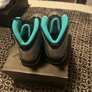 Jordan Kids Black and Gold Sneakers with Teal Interior